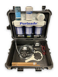 Purinade Five-Barrier water filtration system in a hard case with spare replacement filter cartridges on top