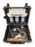 Purinade Five-Barrier water filtration system packed in a hard case with pump and filter housings